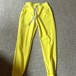 Like New High waisted figs Zamora joggers in  lifesaver yellow. XS